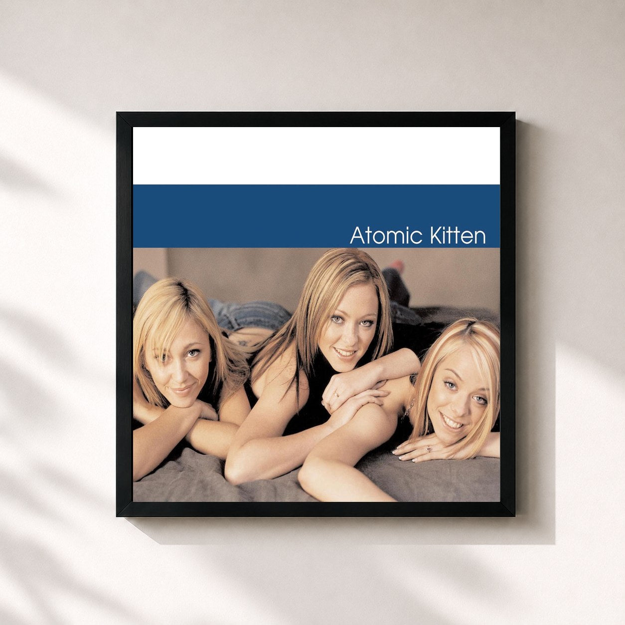 #noir Tableau carré de l'album Atomic Kitten de Atomic Kitten, cadre noir 32x32 cm
