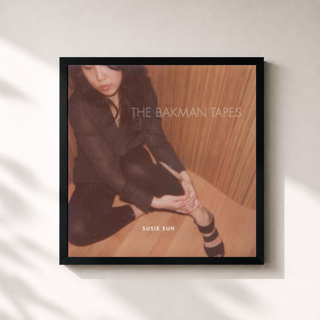 #noir Tableau carré de l'album The Bakman Tapes de Susie Suh, cadre noir 32x32 cm