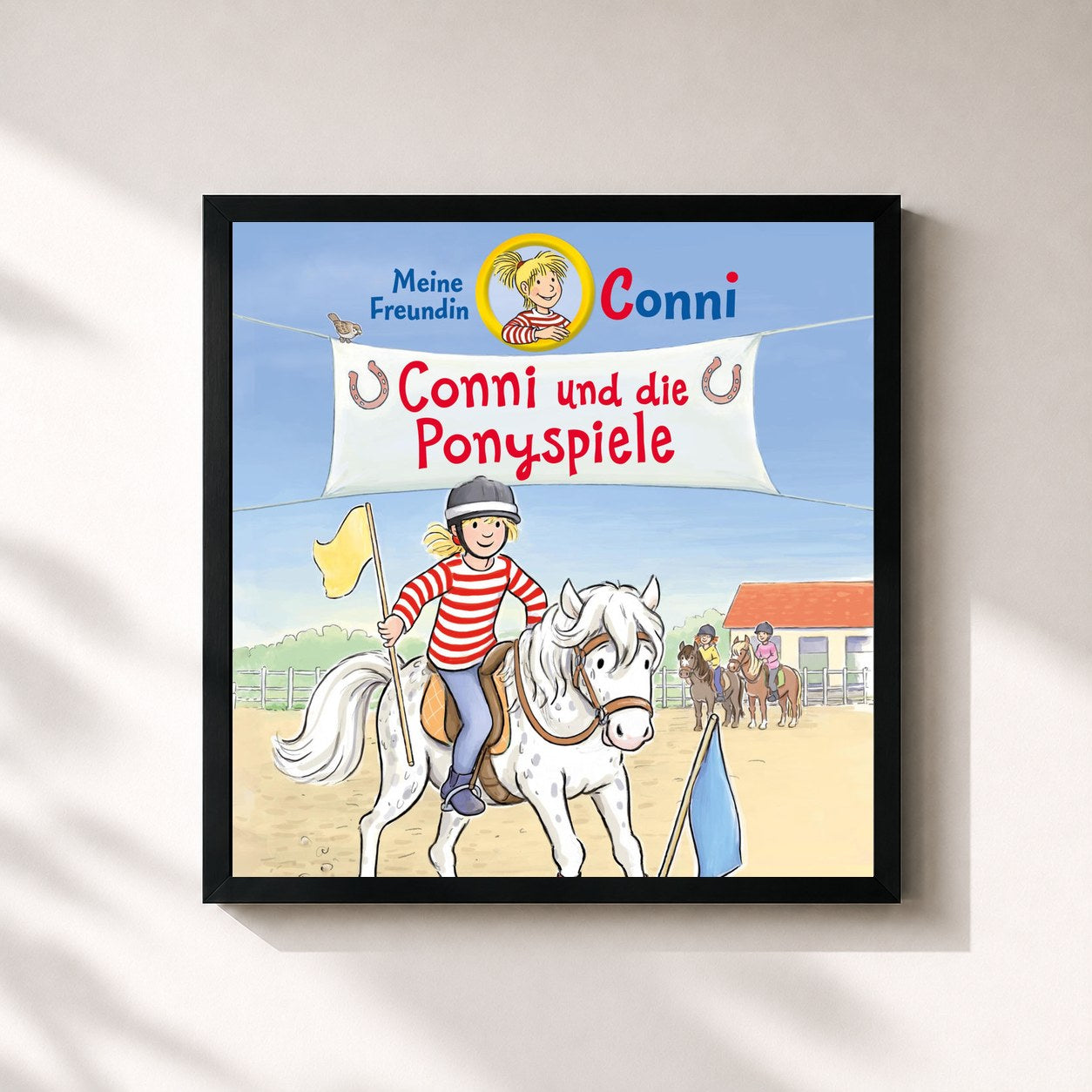 #noir Tableau carré de l'album Conni und die Ponyspiele de Conni, cadre noir 32x32 cm