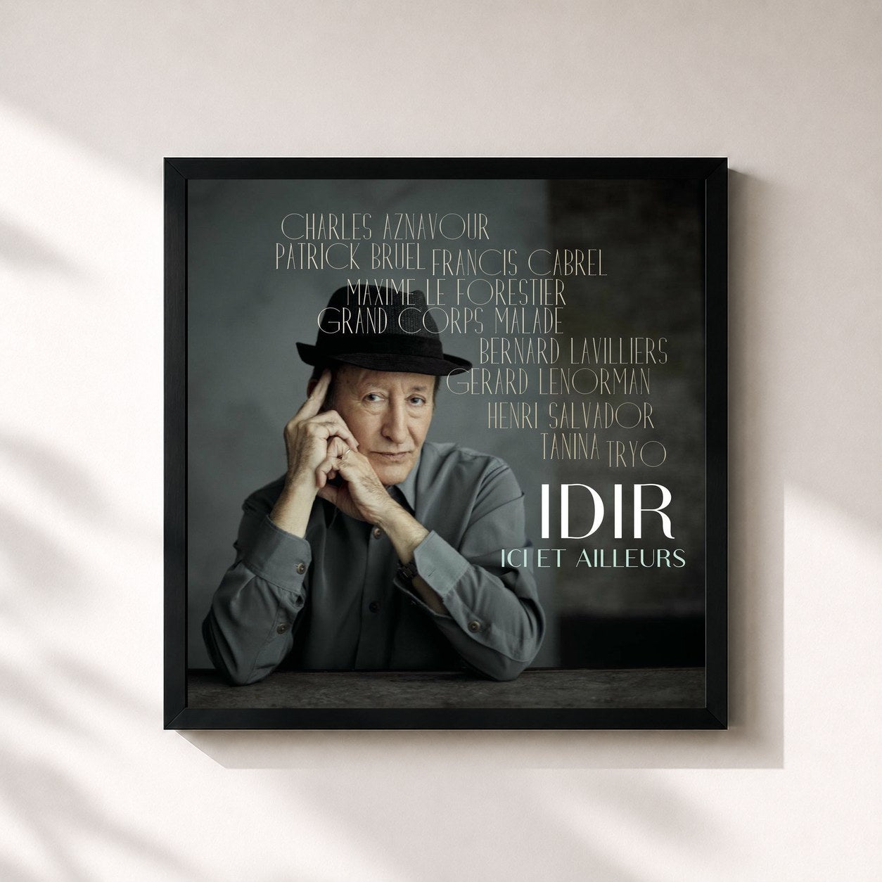#noir Tableau carré de l'album Ici et ailleurs de Idir, cadre noir 32x32 cm