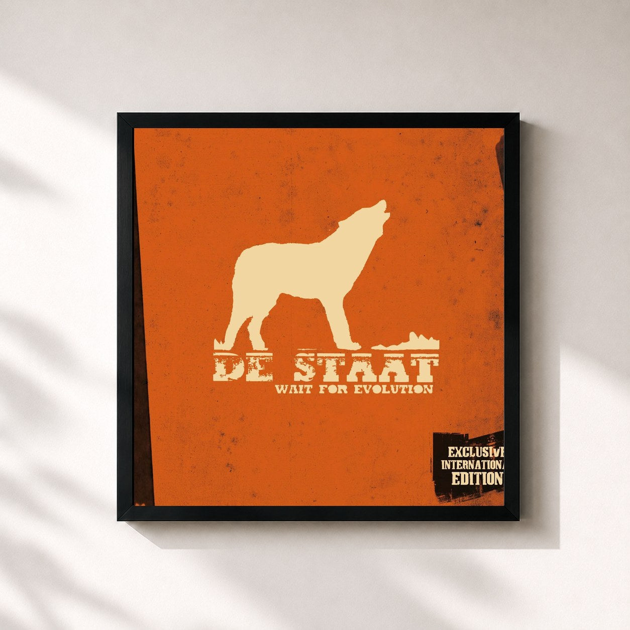 #noir Tableau carré de l'album Wait For Evolution (International Edition) de De Staat, cadre noir 32x32 cm
