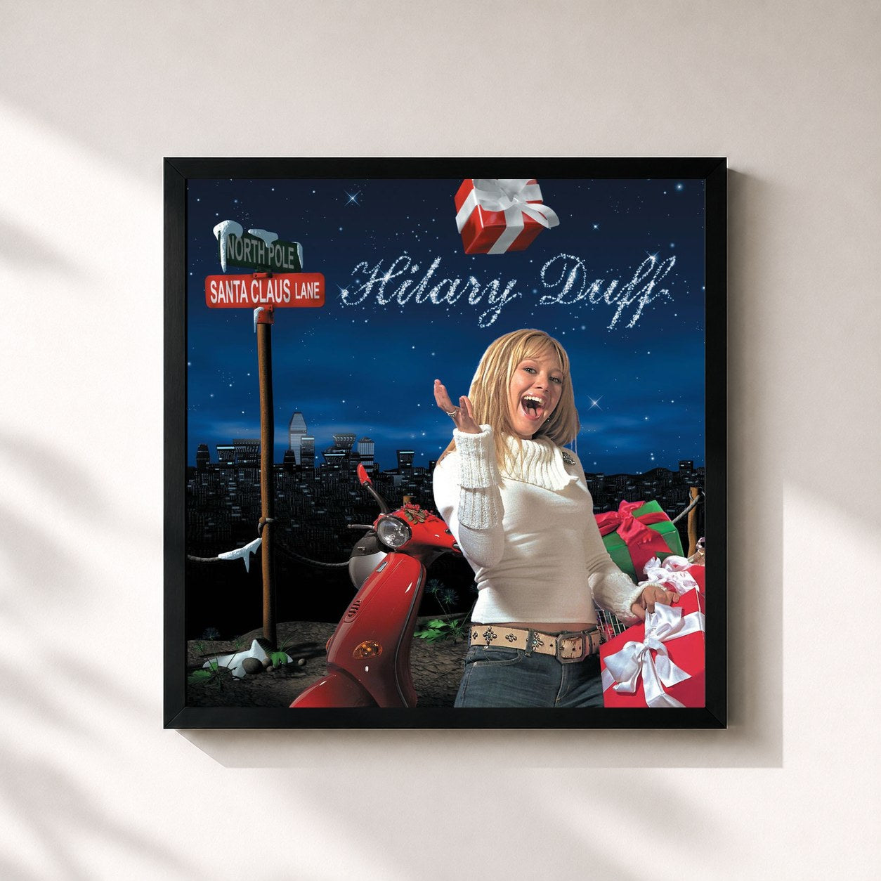#noir Tableau carré de l'album Santa Claus Lane de Hilary Duff, cadre noir 32x32 cm