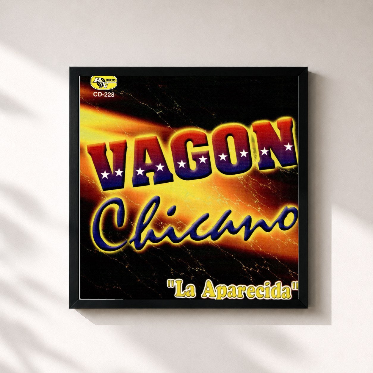 #noir Tableau carré de l'album La Aparecida de Vagon Chicano, cadre noir 32x32 cm