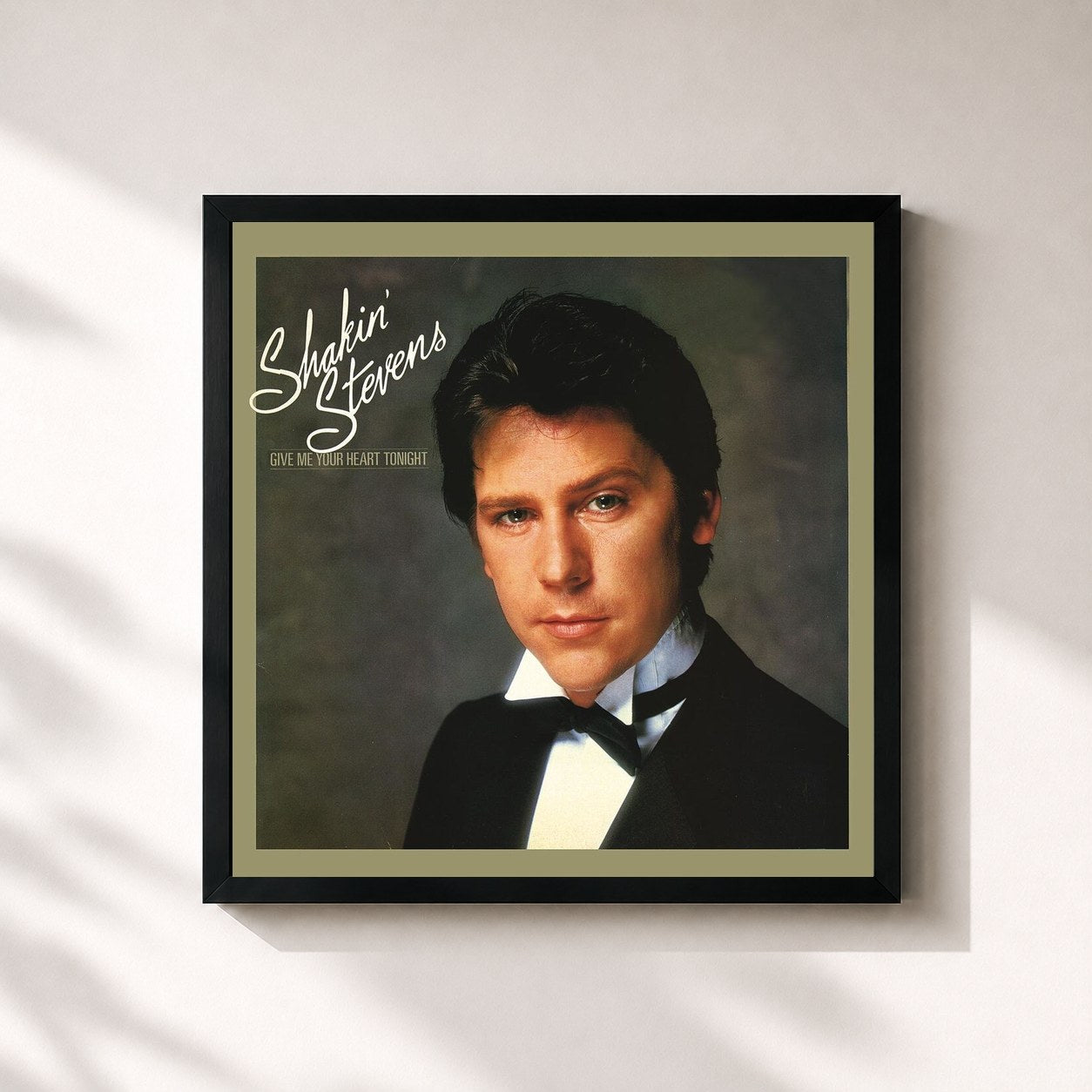 #noir Tableau carré de l'album Give Me Your Heart Tonight de Shakin' Stevens, cadre noir 32x32 cm