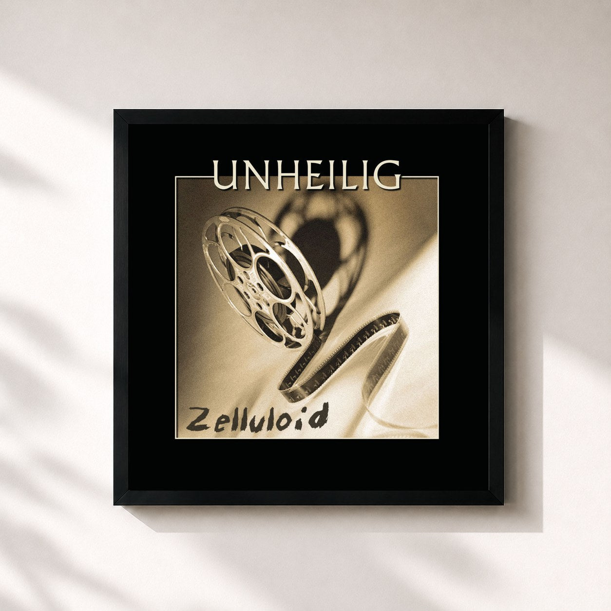 #noir Tableau carré de l'album Zelluloid de Unheilig, cadre noir 32x32 cm