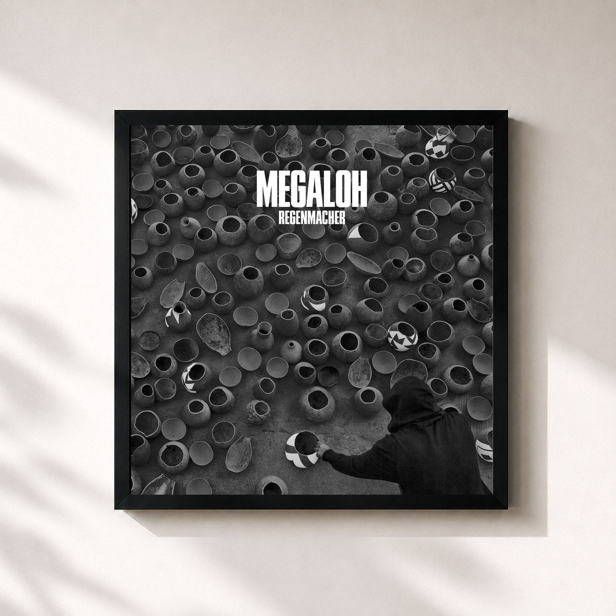 #noir Tableau carré de l'album Regenmacher (Deluxe Version) de Megaloh, cadre noir 32x32 cm