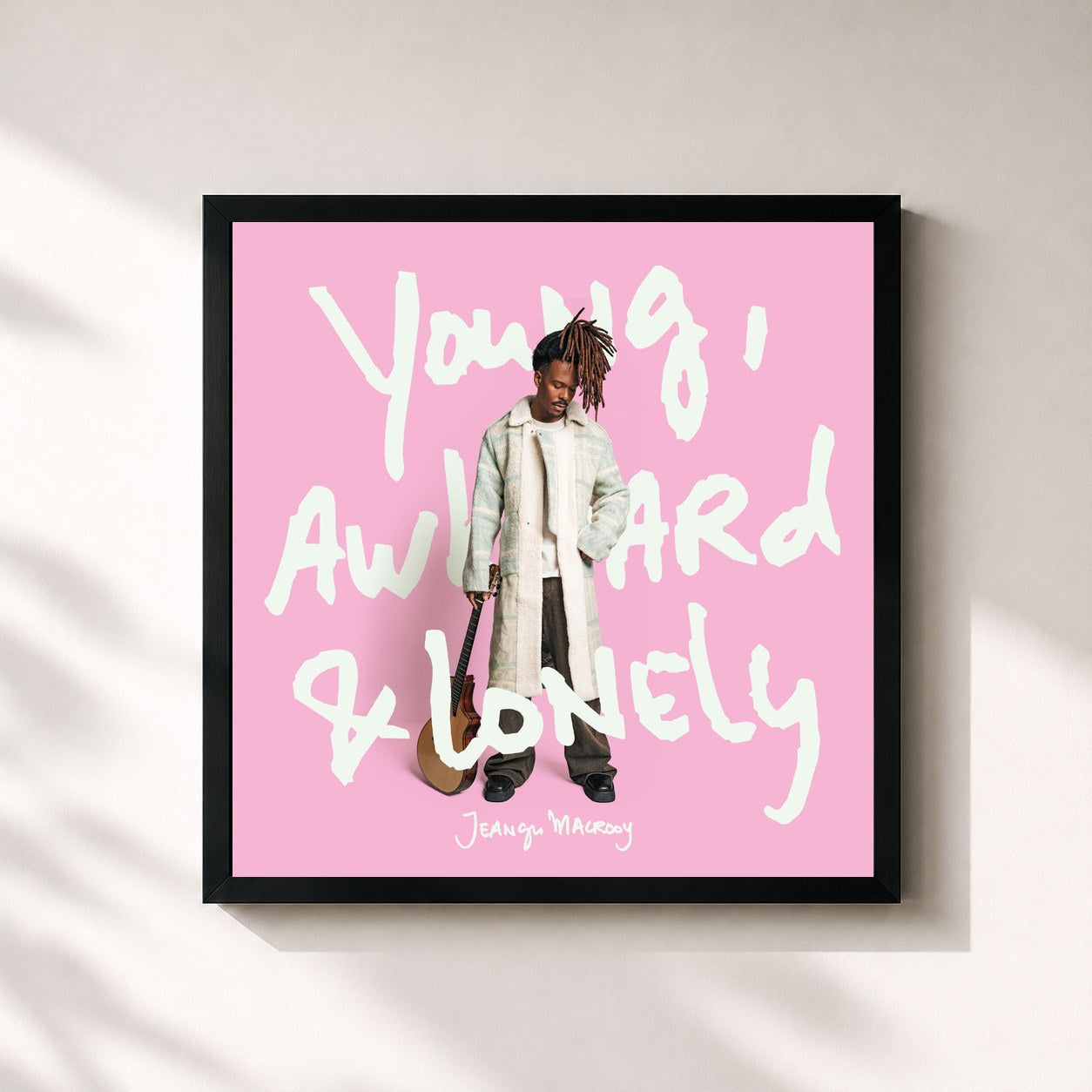 #noir Tableau carré de l'album Young, Awkward & Lonely de Jeangu Macrooy, cadre noir 32x32 cm