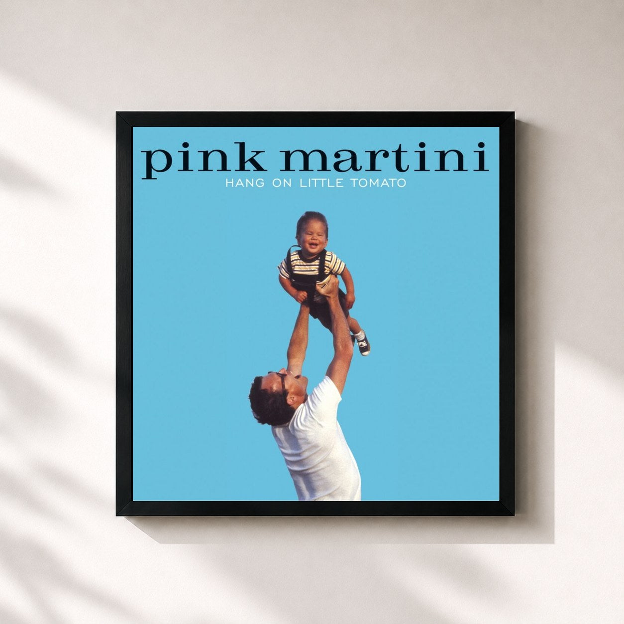 #noir Tableau carré de l'album Hang on Little Tomato de Pink Martini, cadre noir 32x32 cm