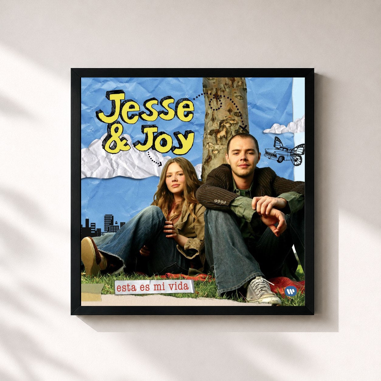 #noir Tableau carré de l'album Esta Es Mi Vida de Jesse & Joy, cadre noir 32x32 cm
