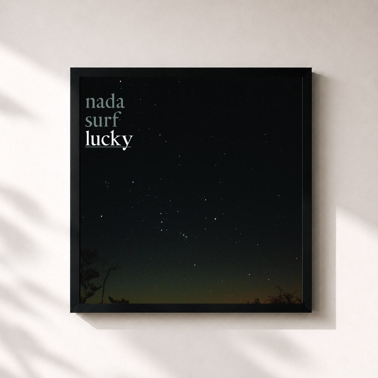 #noir Tableau carré de l'album Lucky de Nada Surf, cadre noir 32x32 cm
