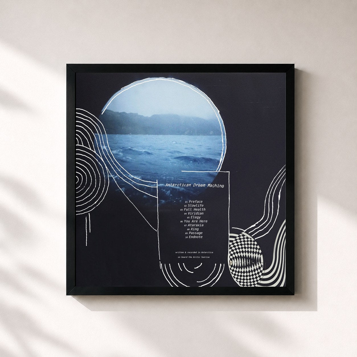#noir Tableau carré de l'album Antarctican Dream Machine de Novo Amor, cadre noir 32x32 cm
