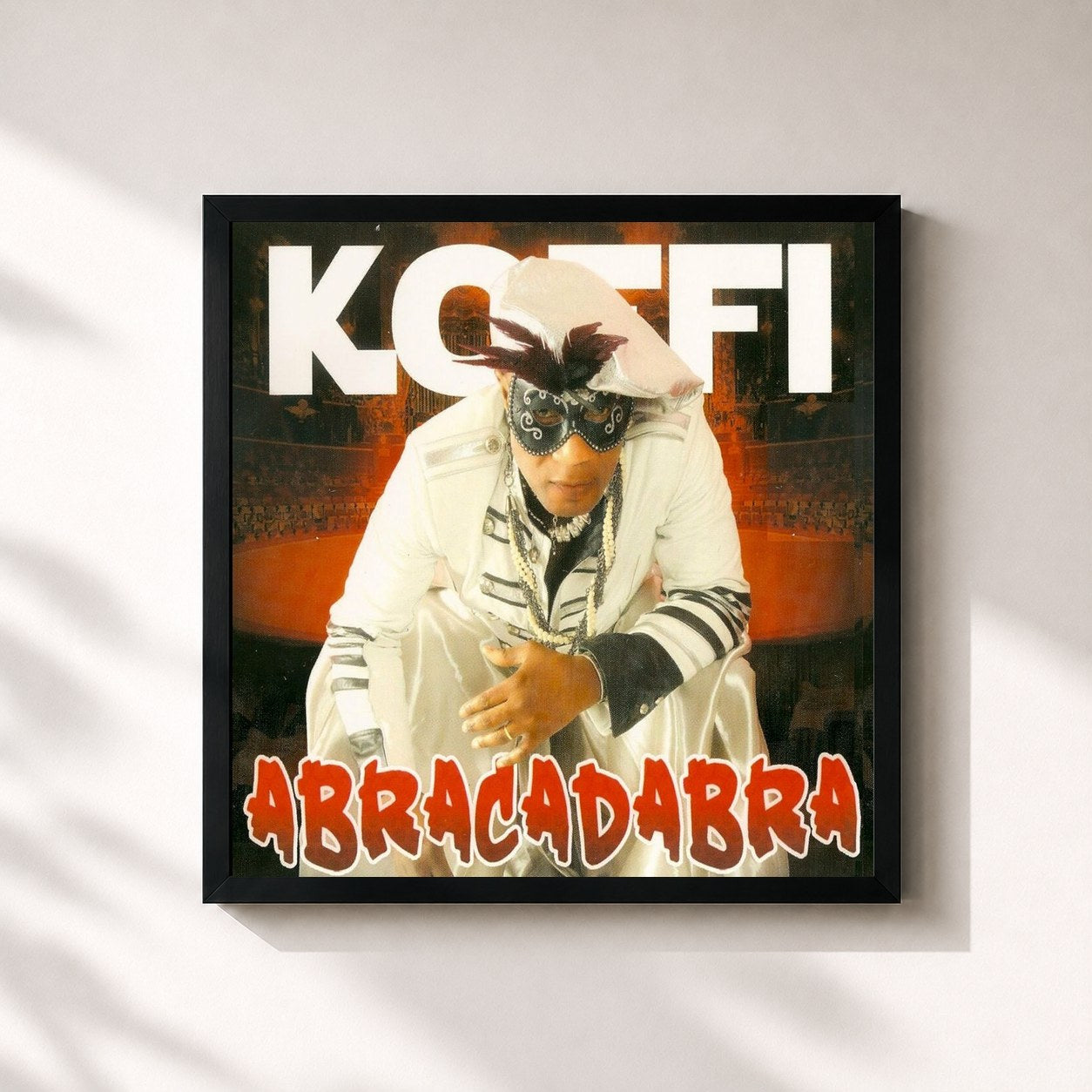 #noir Tableau carré de l'album Abracadabra de Koffi Olomidé, cadre noir 32x32 cm