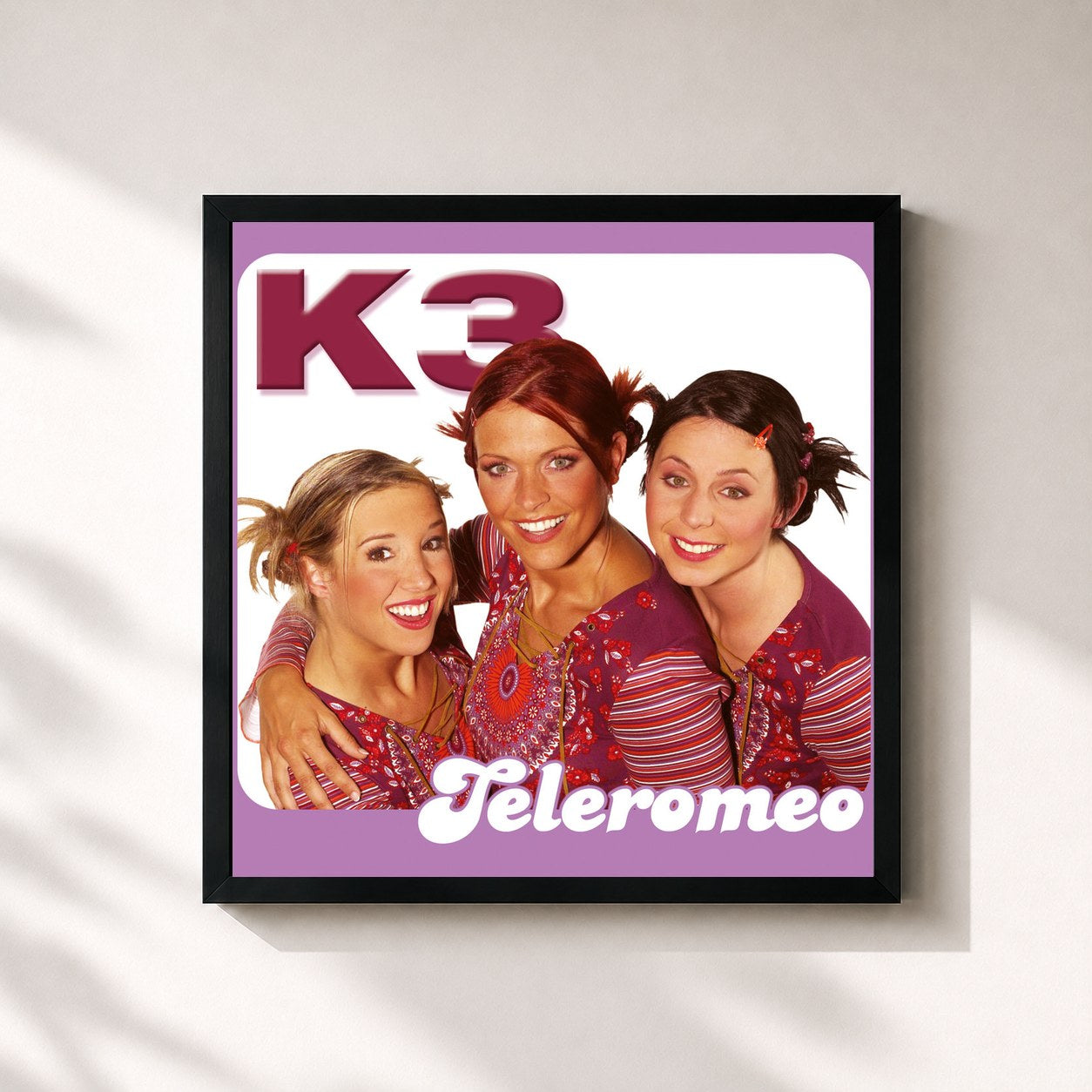 #noir Tableau carré de l'album Tele-Romeo de K3, cadre noir 32x32 cm