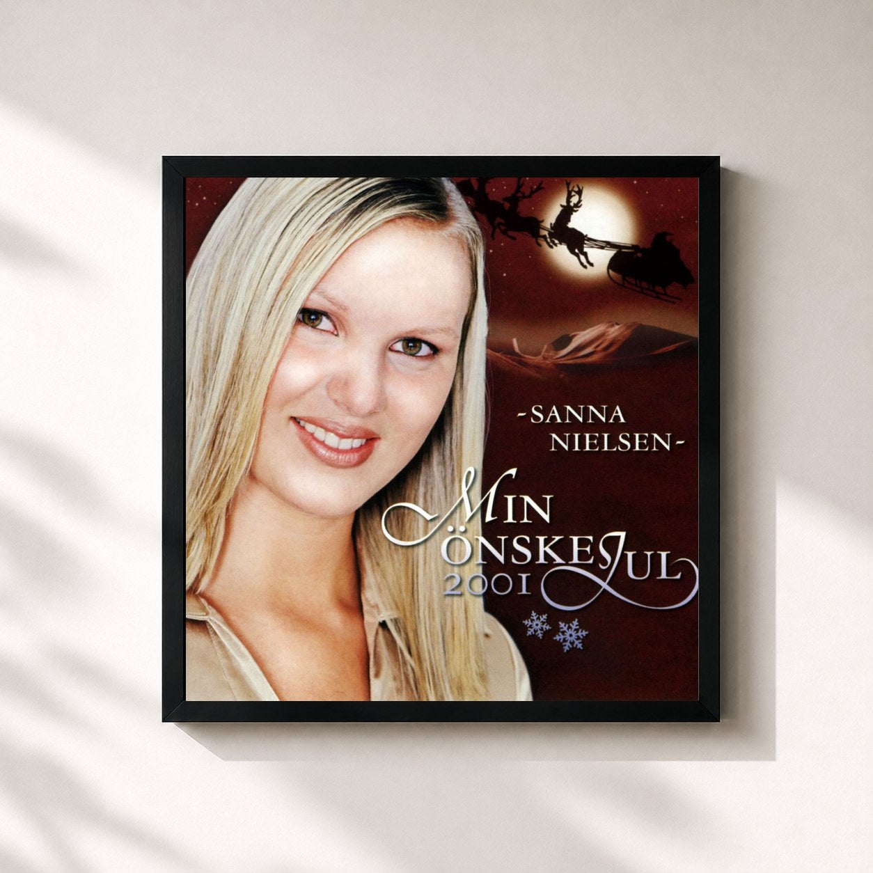 #noir Tableau carré de l'album Min önskejul 2001 de Sanna Nielsen, cadre noir 32x32 cm