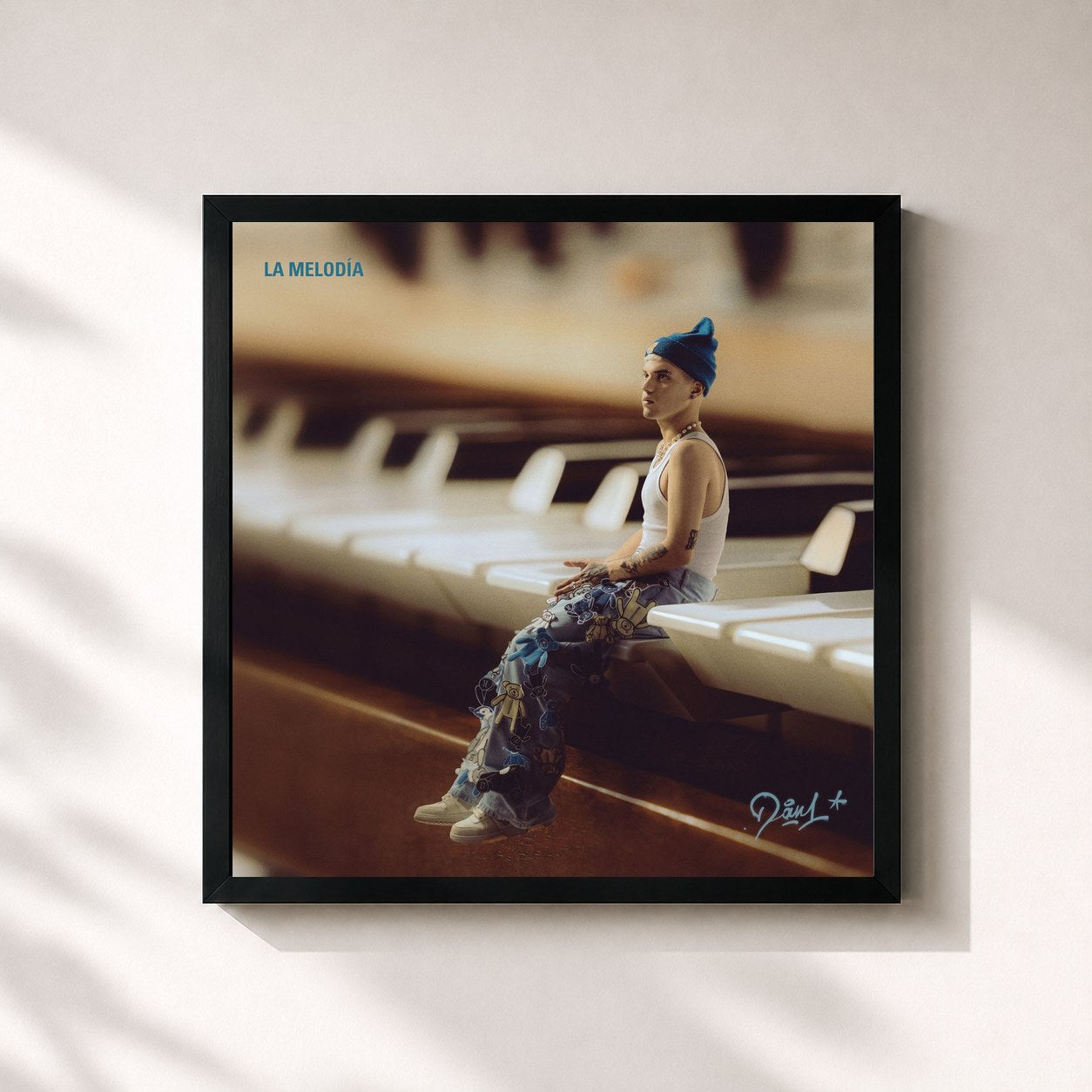 #noir Tableau carré de l'album La Melodía de Dani, cadre noir 32x32 cm