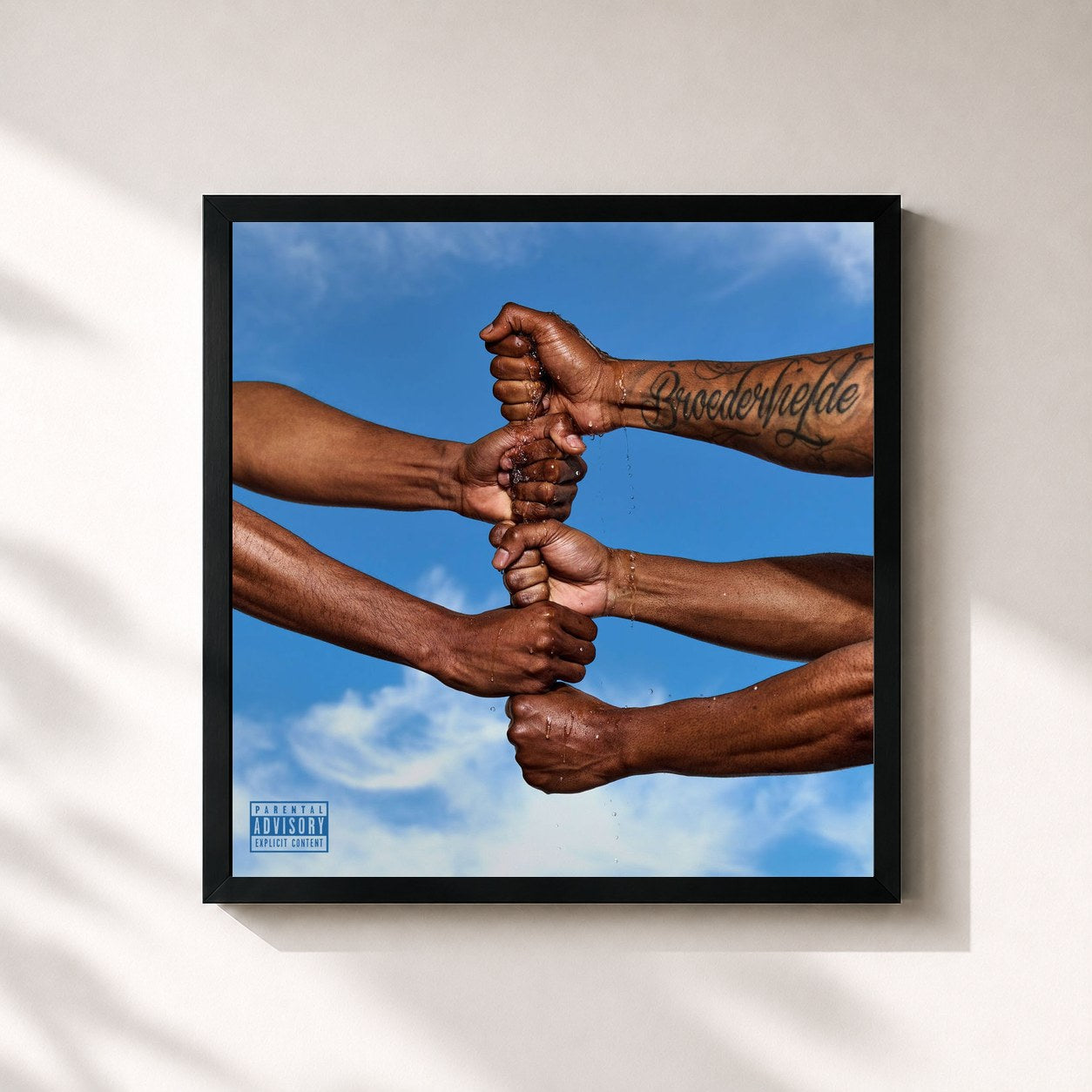 #noir Tableau carré de l'album De Ene Hand Wast De Ander de Broederliefde, cadre noir 32x32 cm