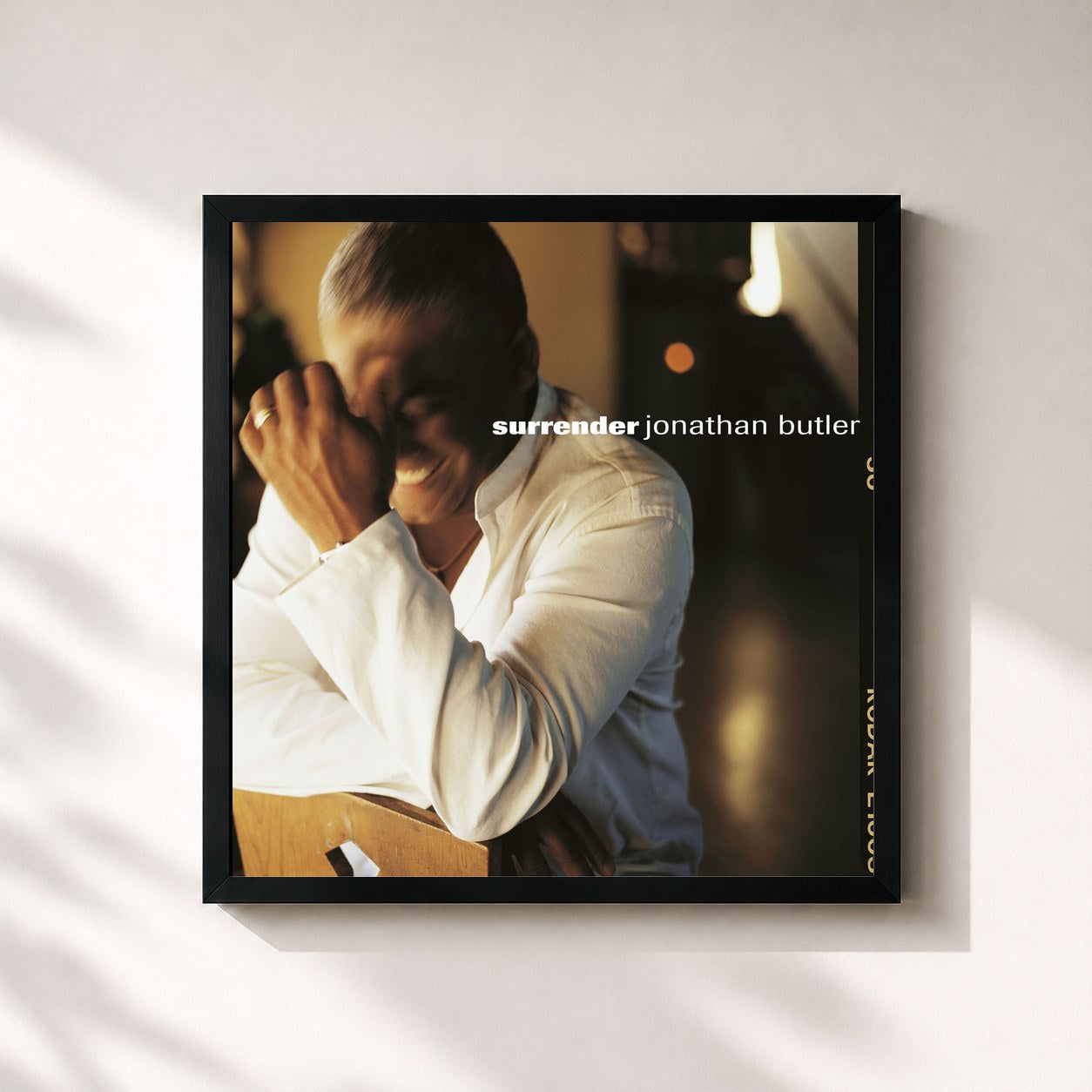 #noir Tableau carré de l'album Surrender de Jonathan Butler, cadre noir 32x32 cm