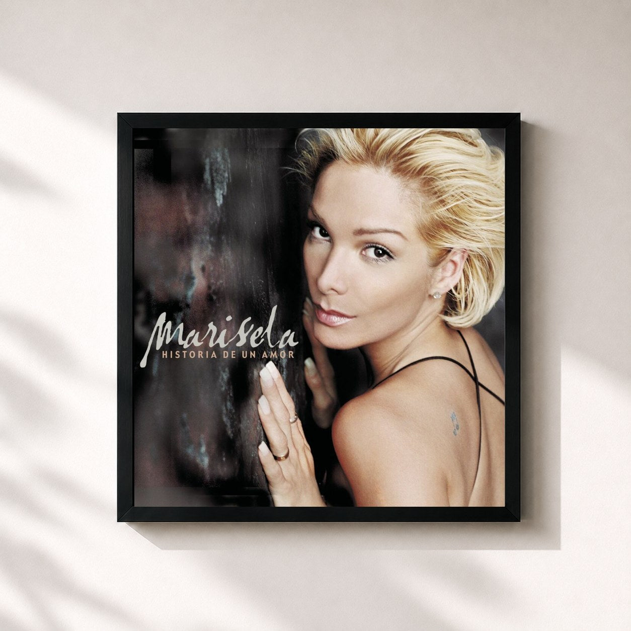 #noir Tableau carré de l'album Historia de un Amor de Marisela, cadre noir 32x32 cm