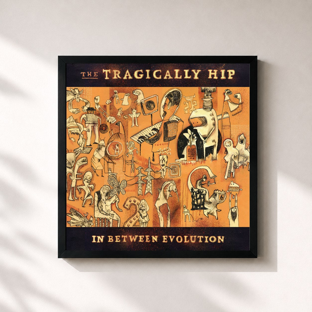 #noir Tableau carré de l'album In Between Evolution de The Tragically Hip, cadre noir 32x32 cm