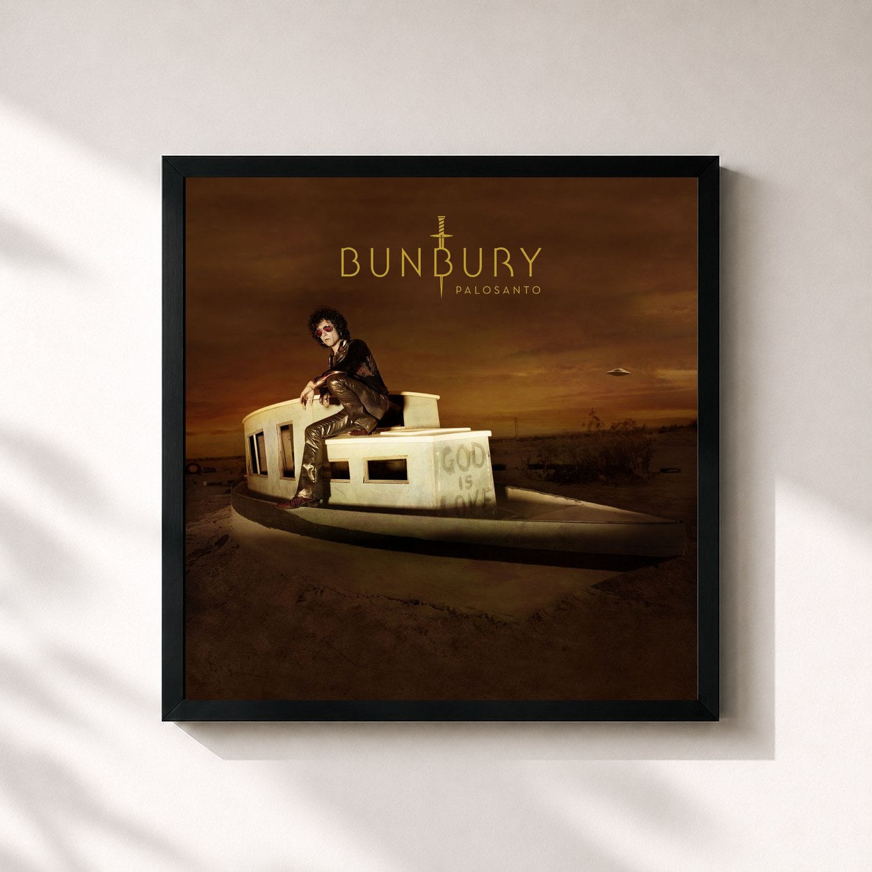 #noir Tableau carré de l'album Palosanto de Bunbury, cadre noir 32x32 cm