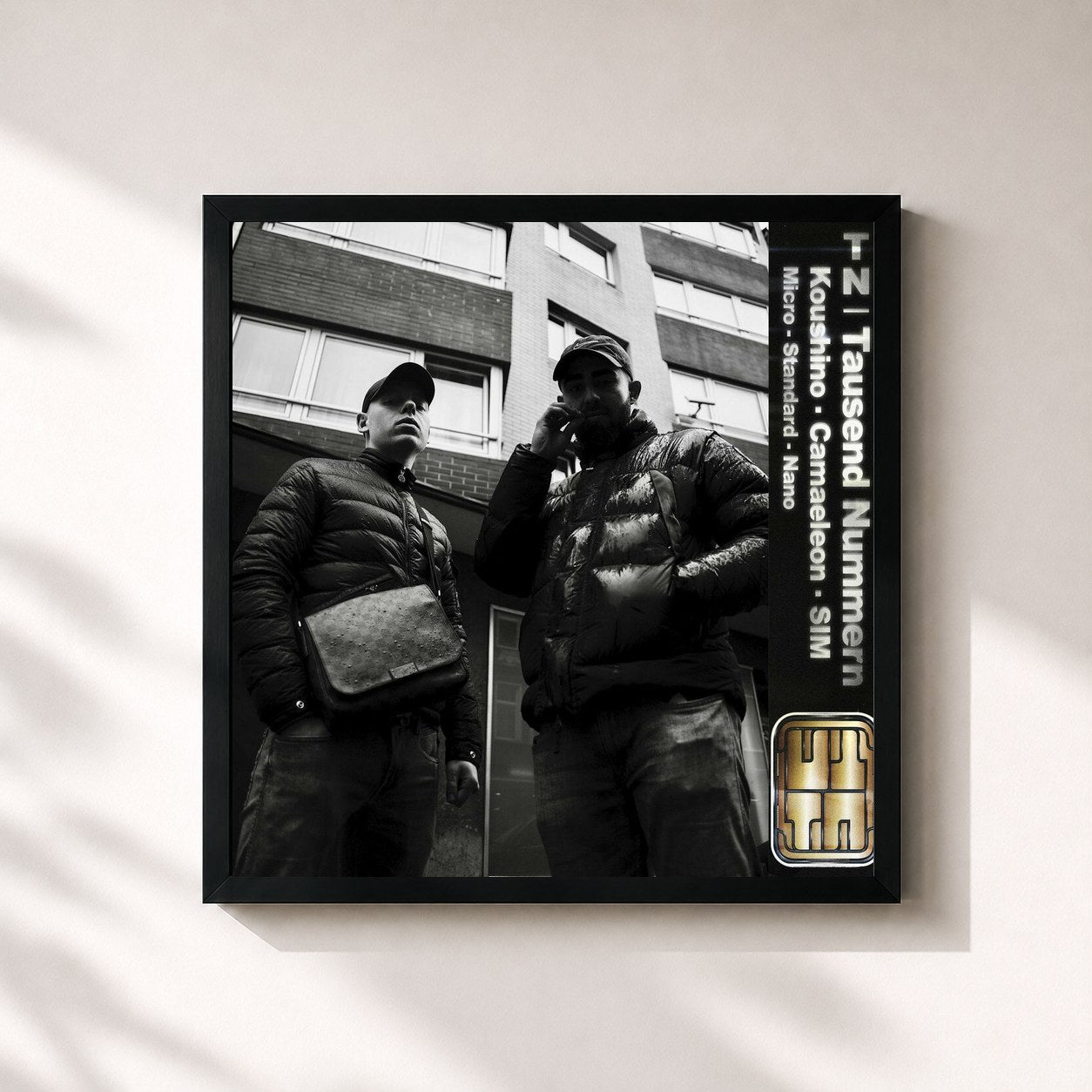 #noir Tableau carré de l'album Tausend Nummern de Koushino, cadre noir 32x32 cm