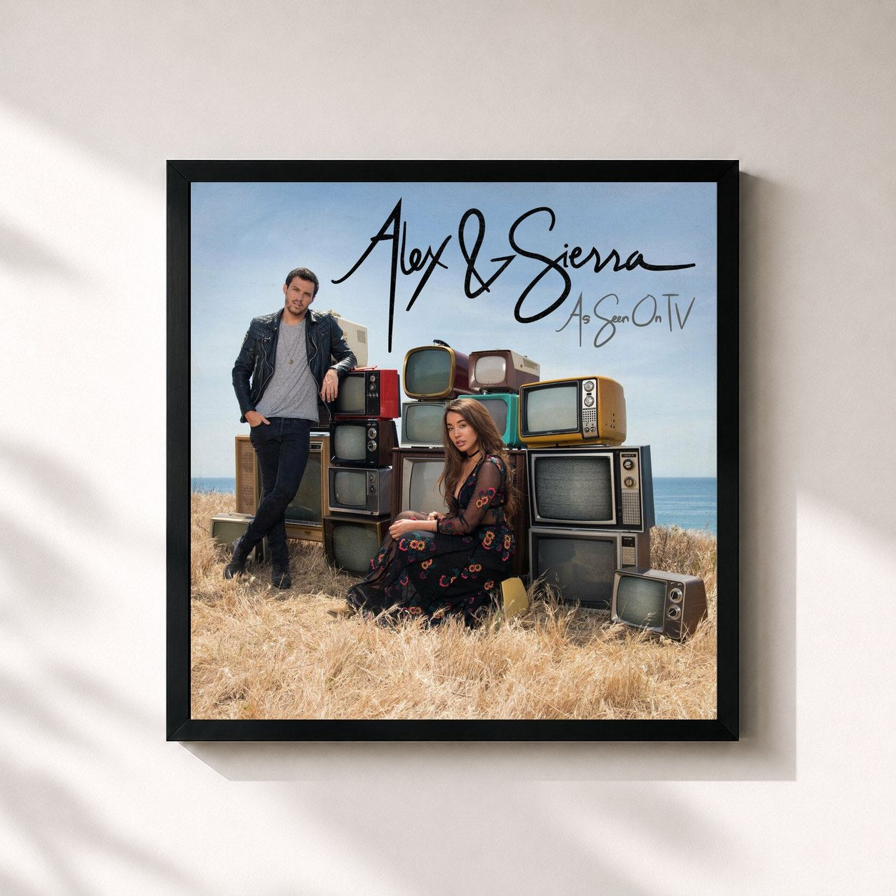 #noir Tableau carré de l'album As Seen On TV de Alex & Sierra, cadre noir 32x32 cm