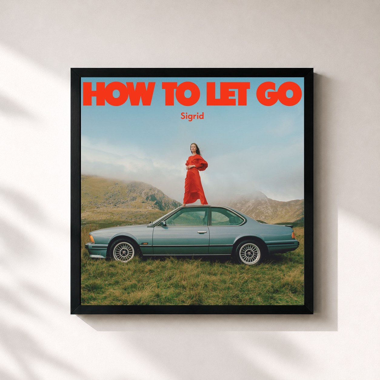 #noir Tableau carré de l'album How To Let Go de Sigrid, cadre noir 32x32 cm