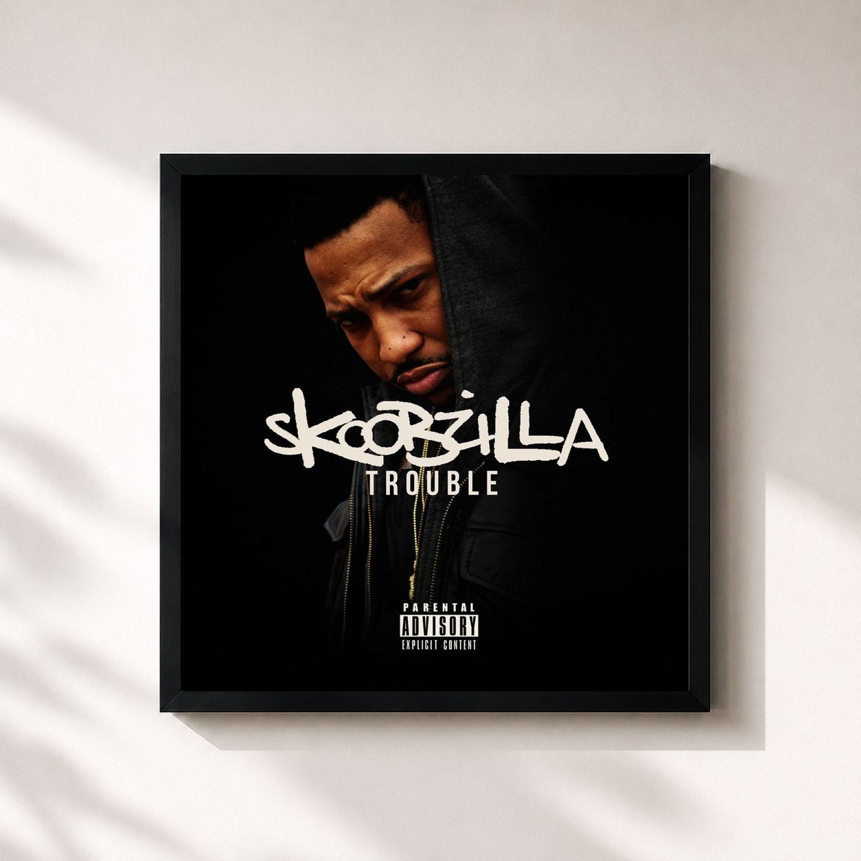 #noir Tableau carré de l'album Skoobzilla de Trouble, cadre noir 32x32 cm