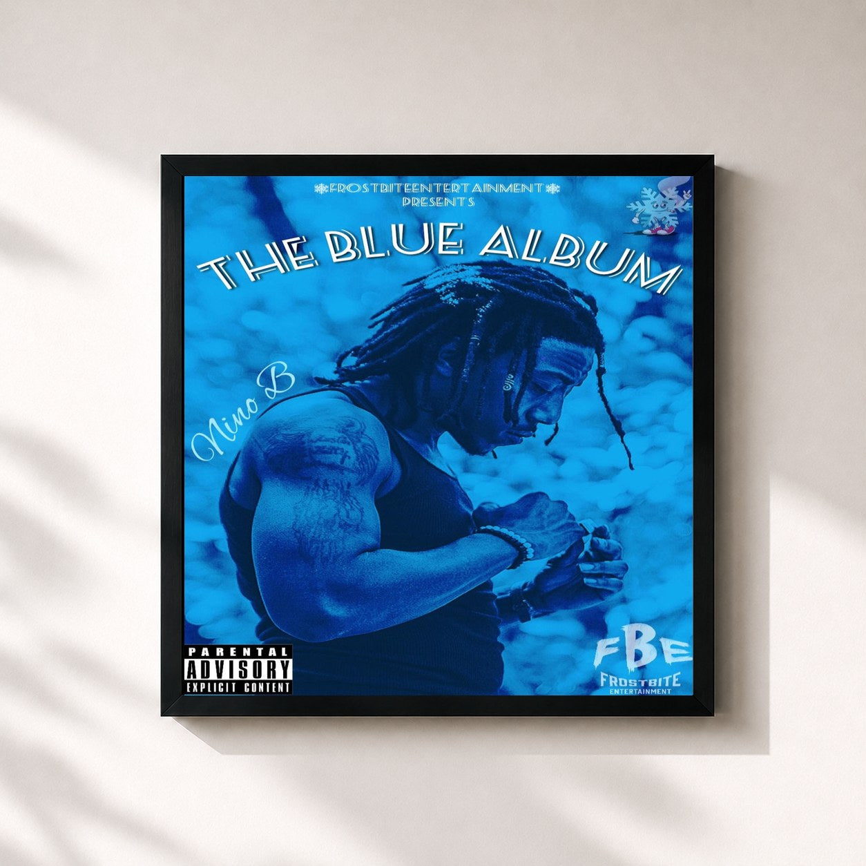 #noir Tableau carré de l'album The Blue Album de Nino B, cadre noir 32x32 cm