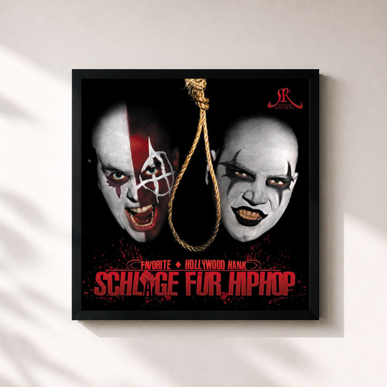 #noir Tableau carré de l'album Schläge für HipHop de Favorite, cadre noir 32x32 cm