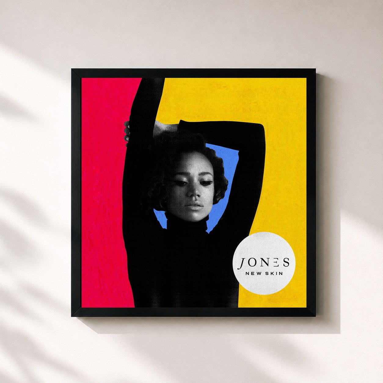 #noir Tableau carré de l'album New Skin de JONES, cadre noir 32x32 cm
