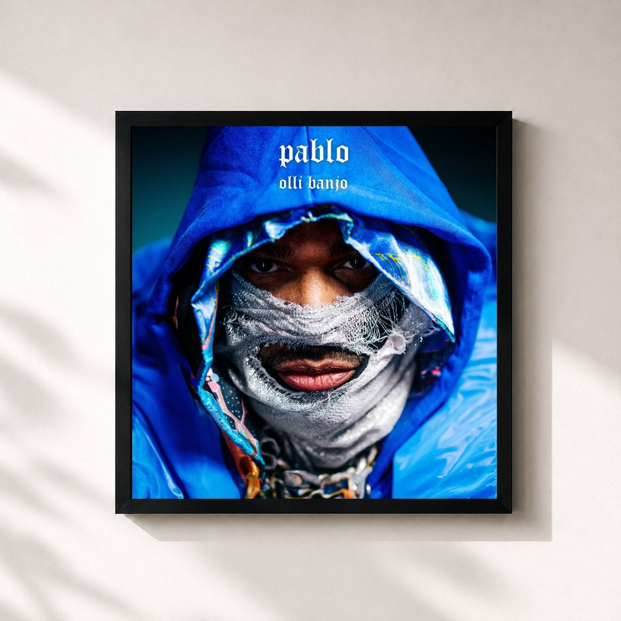 #noir Tableau carré de l'album PABLO de Olli Banjo, cadre noir 32x32 cm