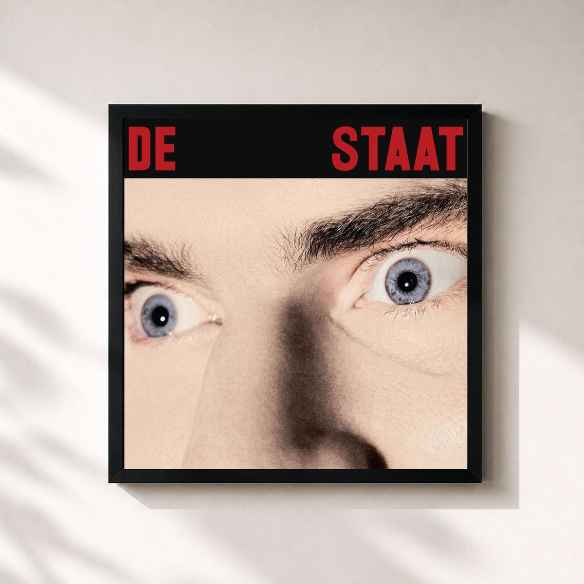 #noir Tableau carré de l'album DE STAAT de De Staat, cadre noir 32x32 cm