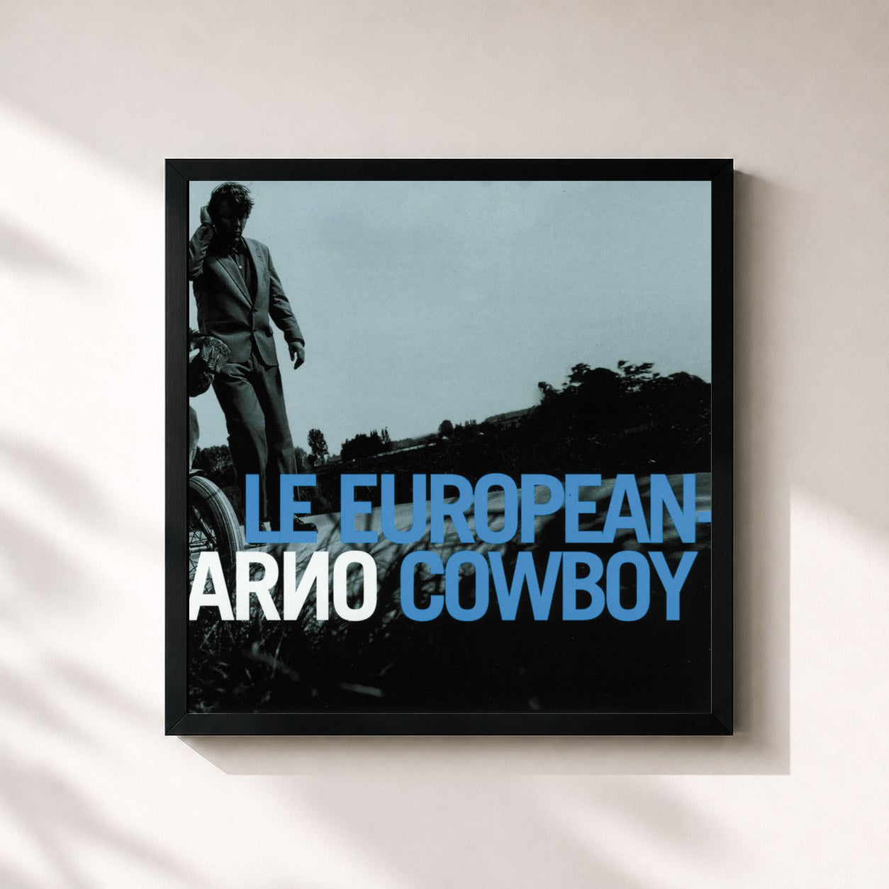 #noir Tableau carré de l'album Le European Cowboy de Arno, cadre noir 32x32 cm