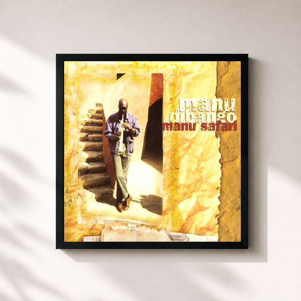 #noir Tableau carré de l'album Manu Safari de Manu Dibango, cadre noir 32x32 cm