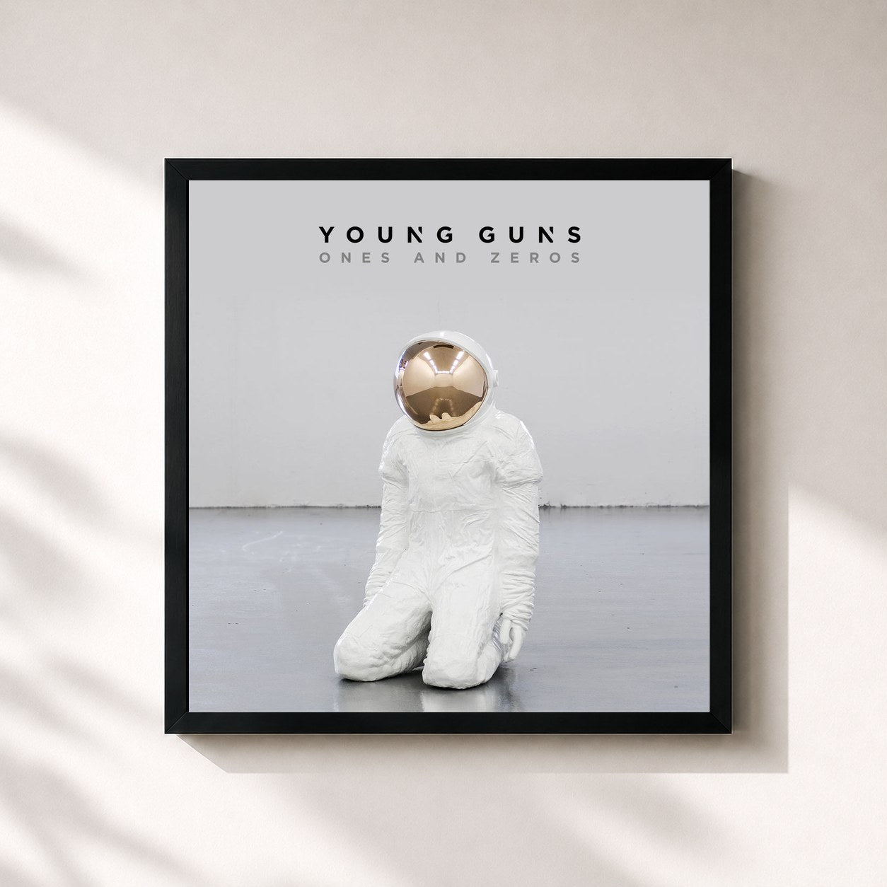 #noir Tableau carré de l'album Ones And Zeros (Deluxe) de Young Guns, cadre noir 32x32 cm
