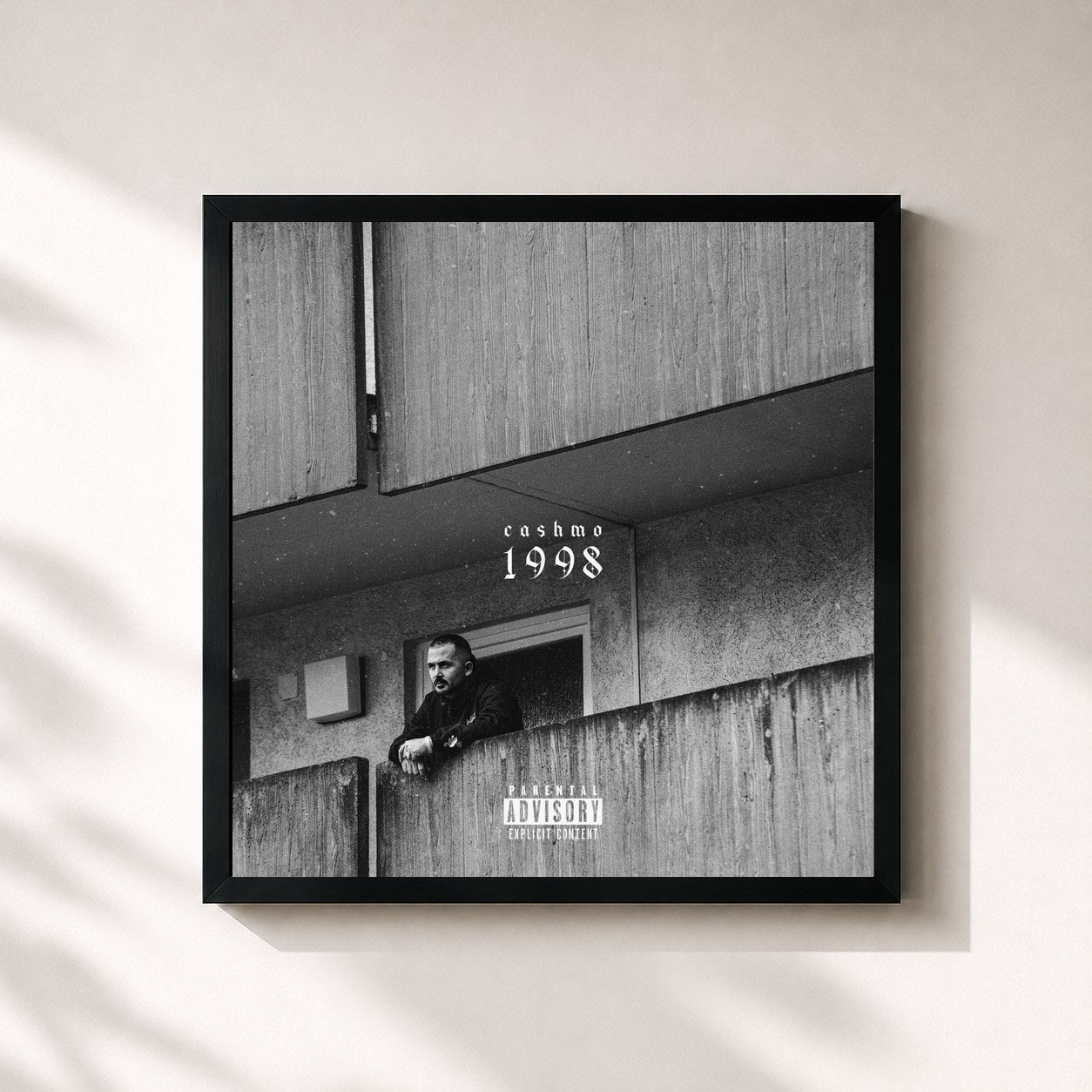 #noir Tableau carré de l'album 1998 de Cashmo, cadre noir 32x32 cm