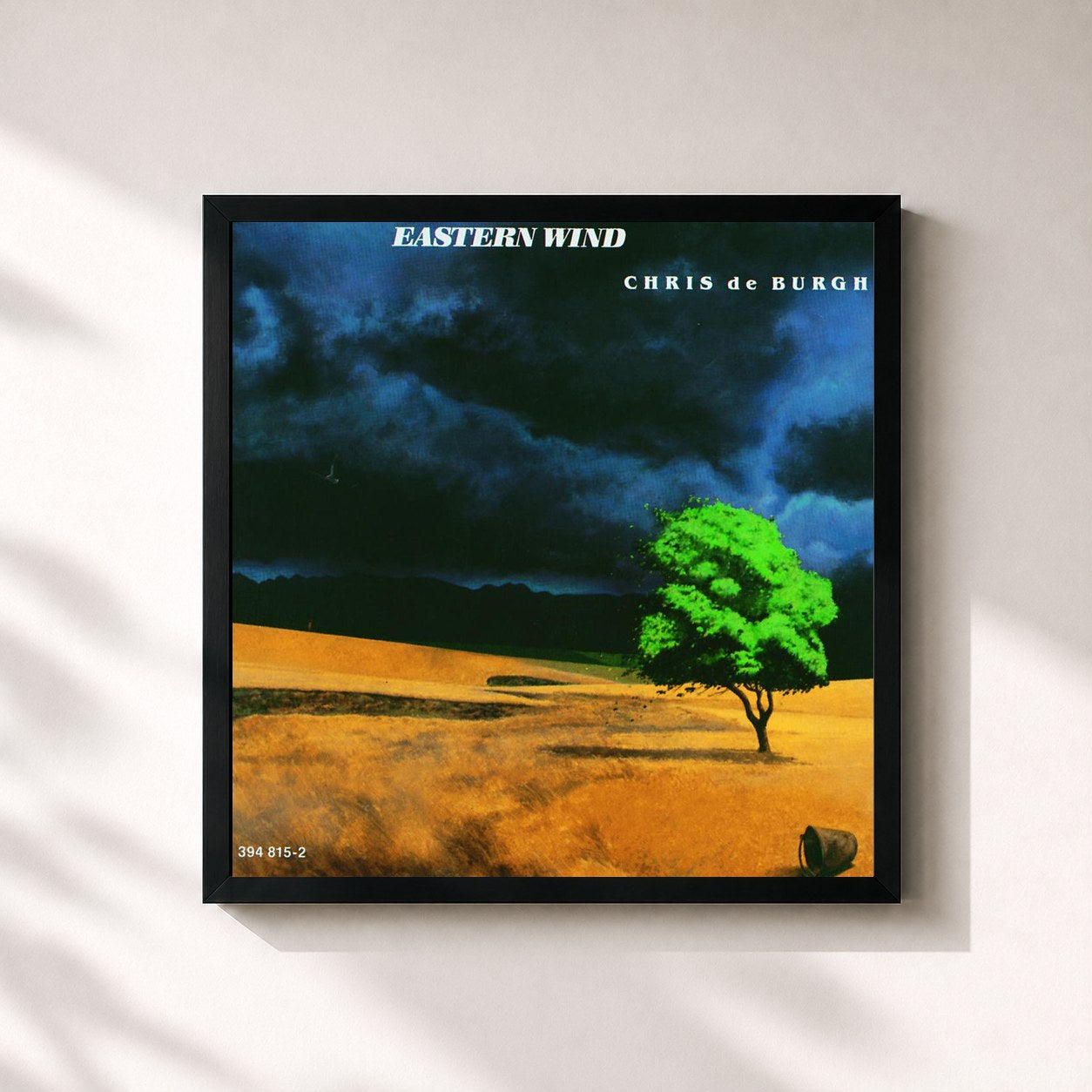 #noir Tableau carré de l'album Eastern Wind de Chris de Burgh, cadre noir 32x32 cm