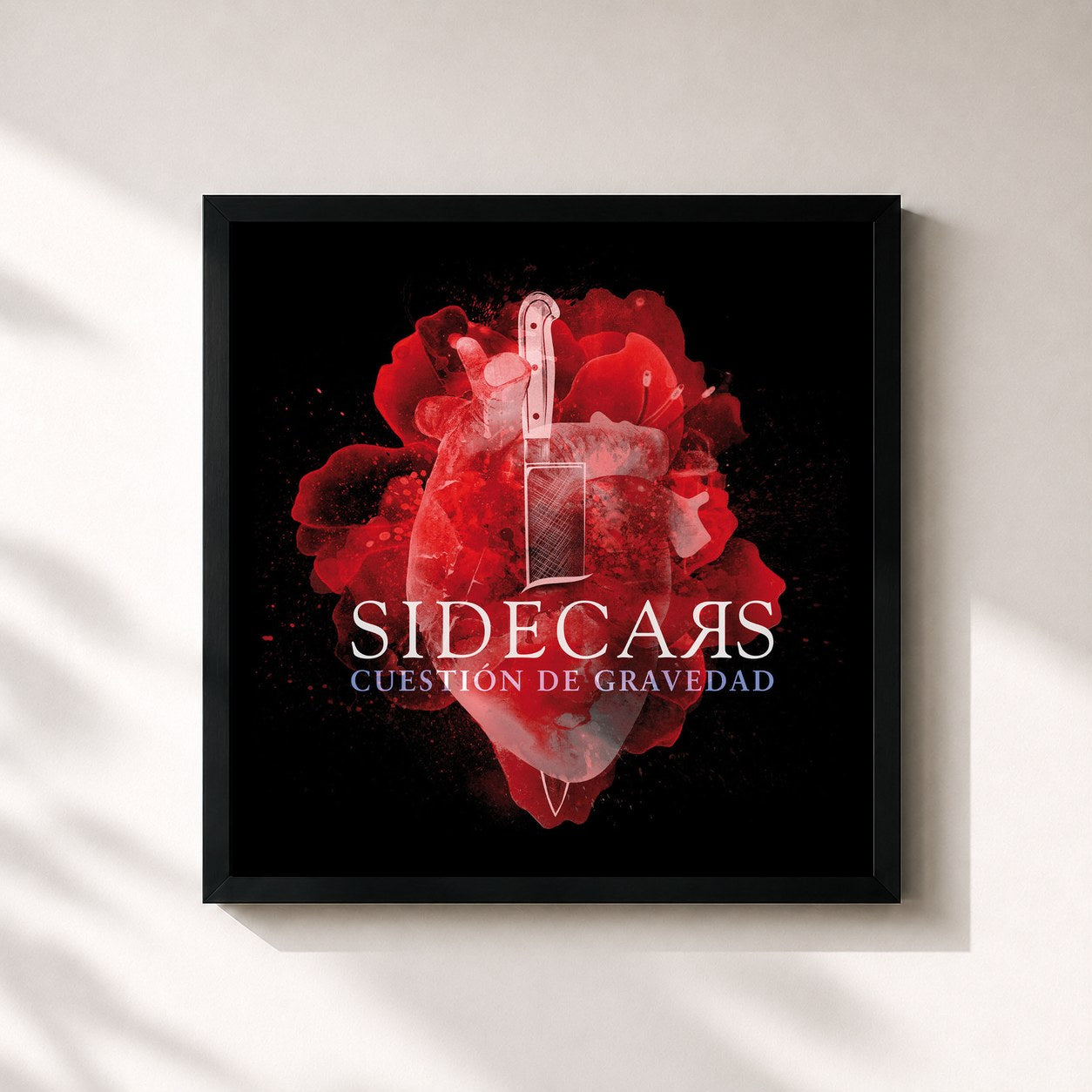 #noir Tableau carré de l'album Cuestión de gravedad de Sidecars, cadre noir 32x32 cm