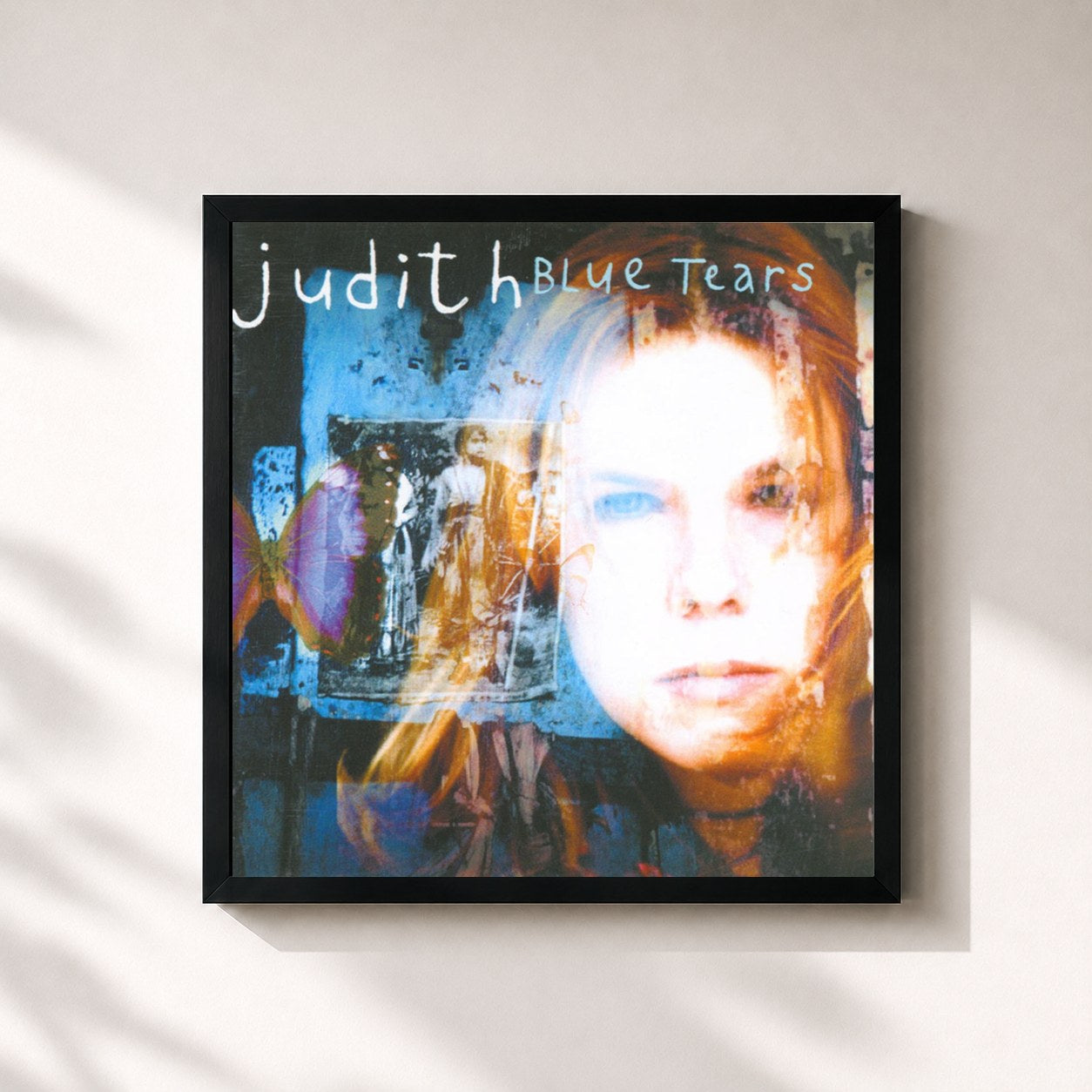 #noir Tableau carré de l'album Blue Tears de Judith, cadre noir 32x32 cm