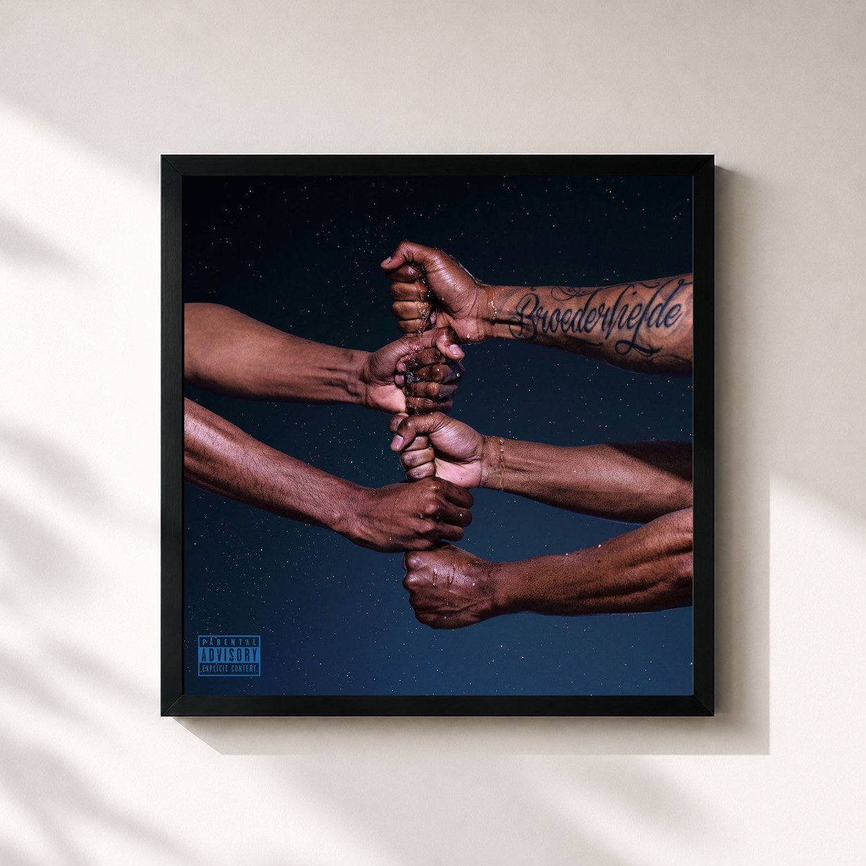#noir Tableau carré de l'album De Ene Hand Wast De Ander (Deluxe) de Broederliefde, cadre noir 32x32 cm