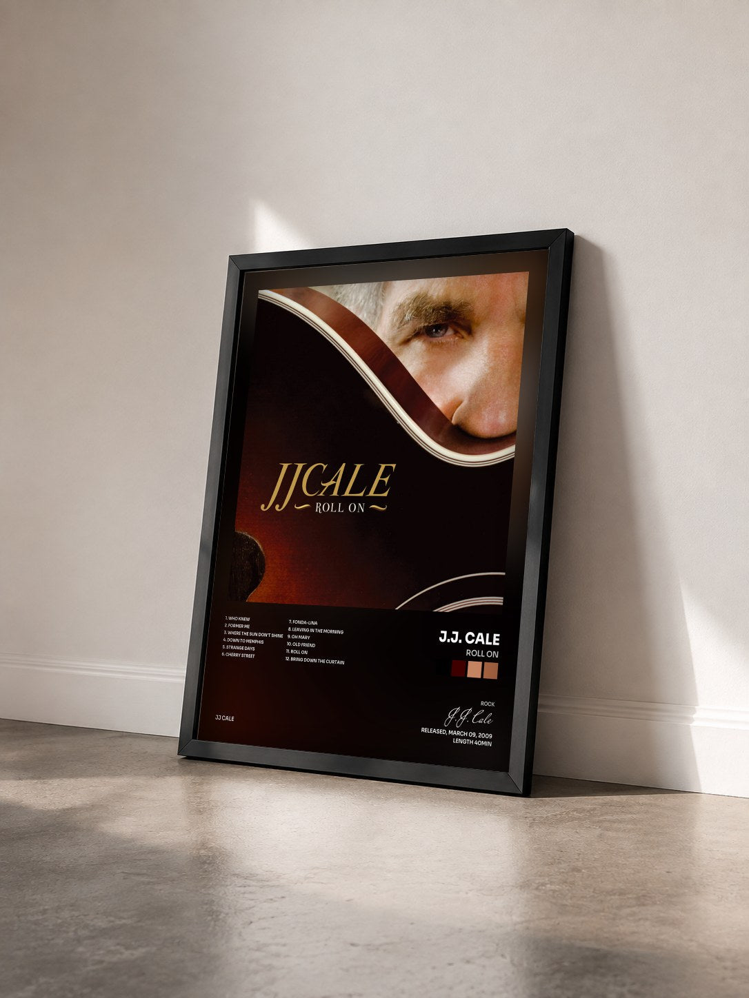 #noir Tableau de l'album Roll On de J.J. Cale vu de trois quarts, cadre noir