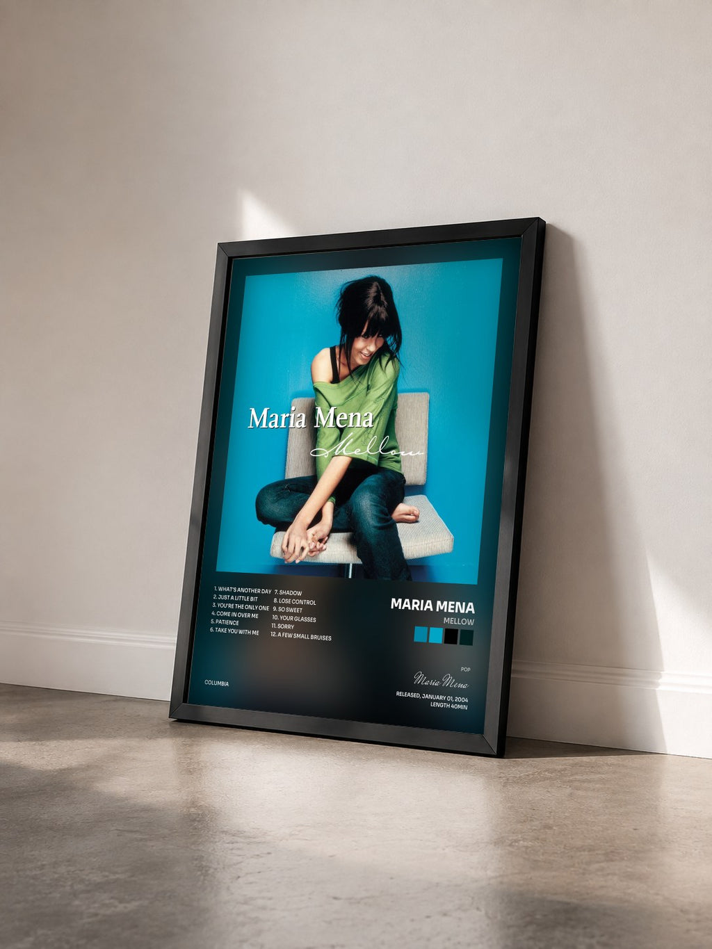 #noir Tableau de l'album Mellow de Maria Mena vu de trois quarts, cadre noir