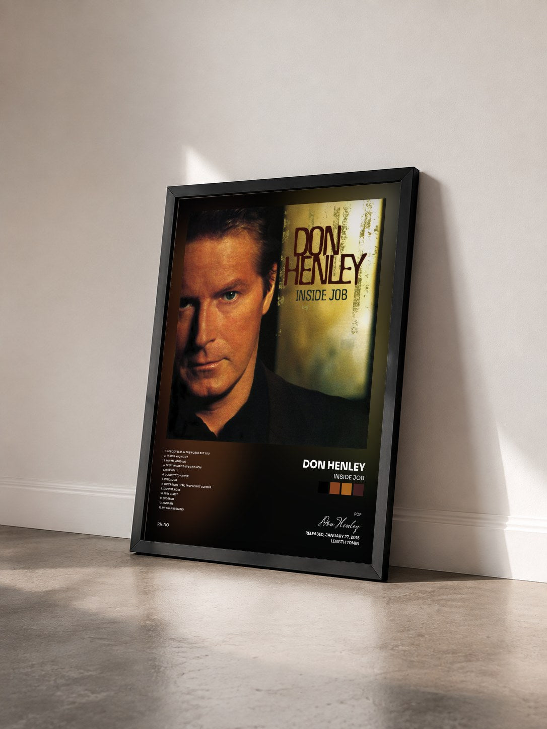 #noir Tableau de l'album Inside Job de Don Henley vu de trois quarts, cadre noir