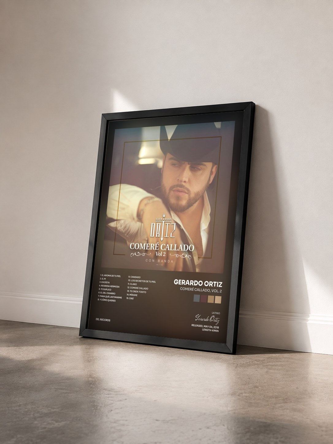 #noir Tableau de l'album Comeré Callado, Vol. 2 de Gerardo Ortiz vu de trois quarts, cadre noir