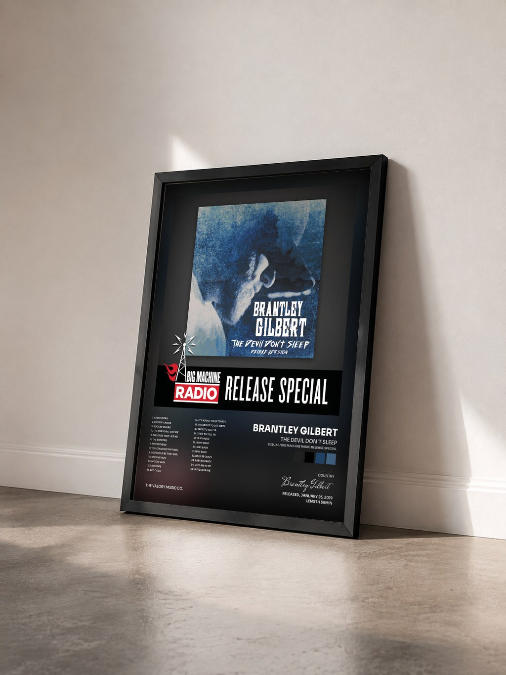 #noir Tableau de l'album The Devil Don't Sleep (Deluxe / Big Machine Radio Release Special) de Brantley Gilbert vu de trois quarts, cadre noir