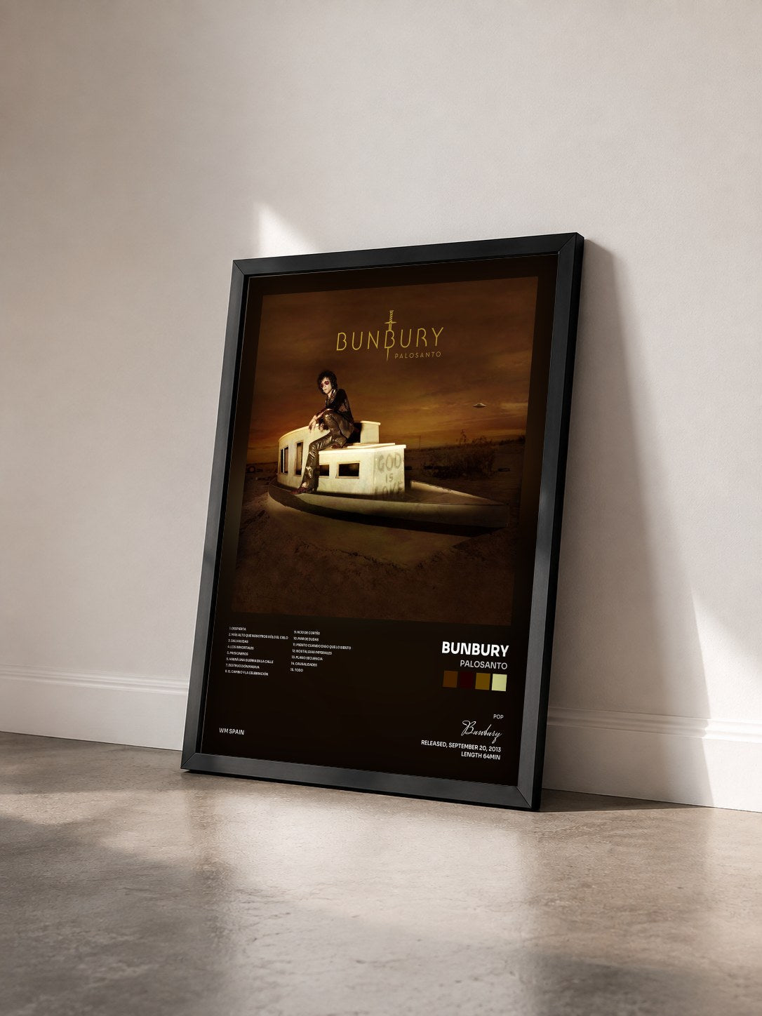 #noir Tableau de l'album Palosanto de Bunbury vu de trois quarts, cadre noir