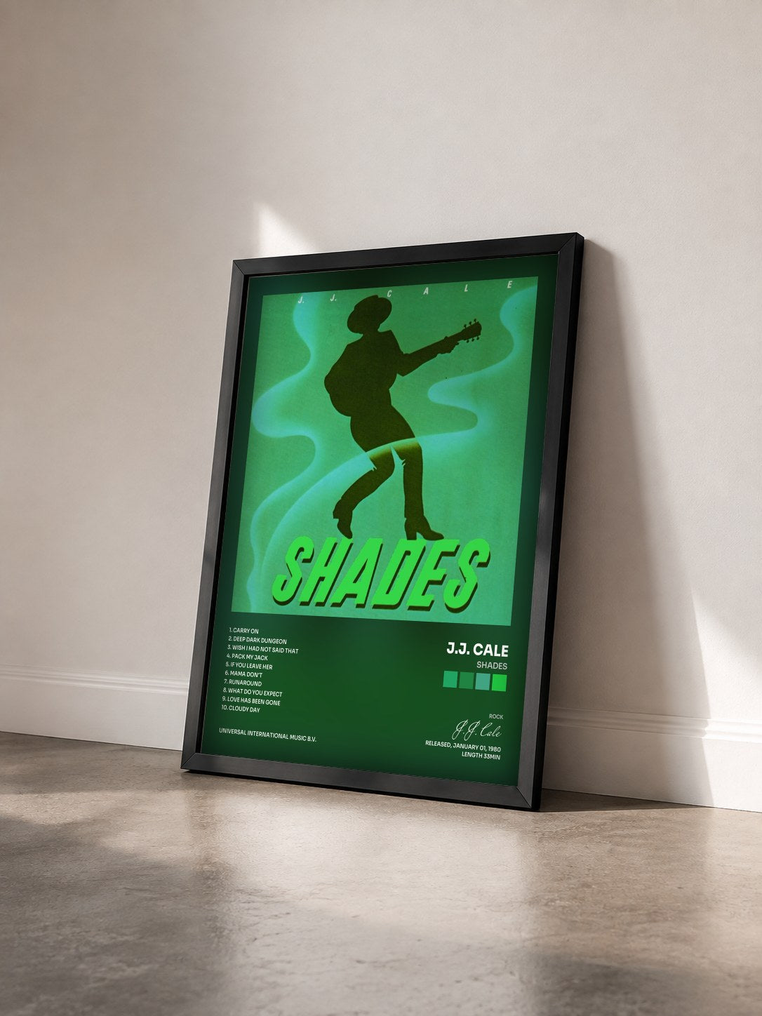 #noir Tableau de l'album Shades de J.J. Cale vu de trois quarts, cadre noir