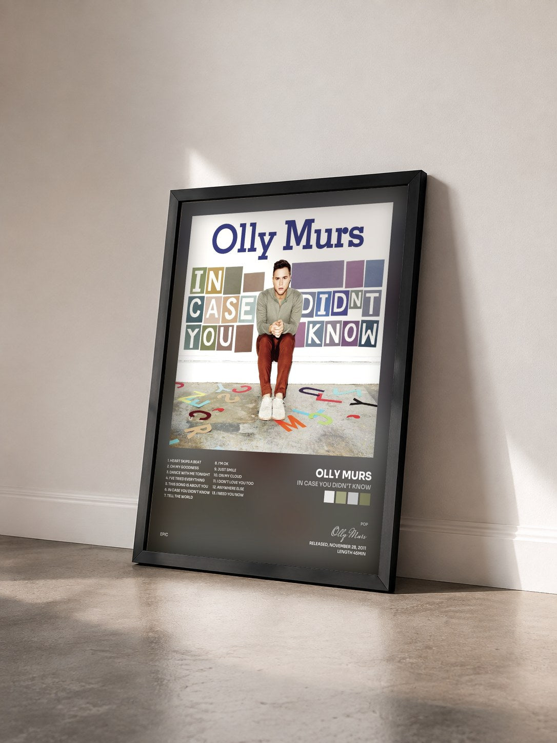 #noir Tableau de l'album In Case You Didn't Know de Olly Murs vu de trois quarts, cadre noir