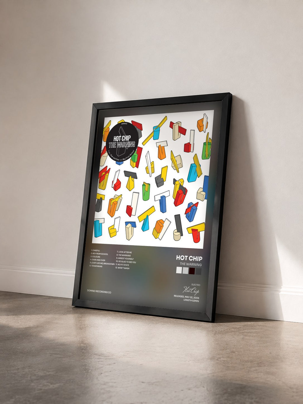 #noir Tableau de l'album The Warning de Hot Chip vu de trois quarts, cadre noir
